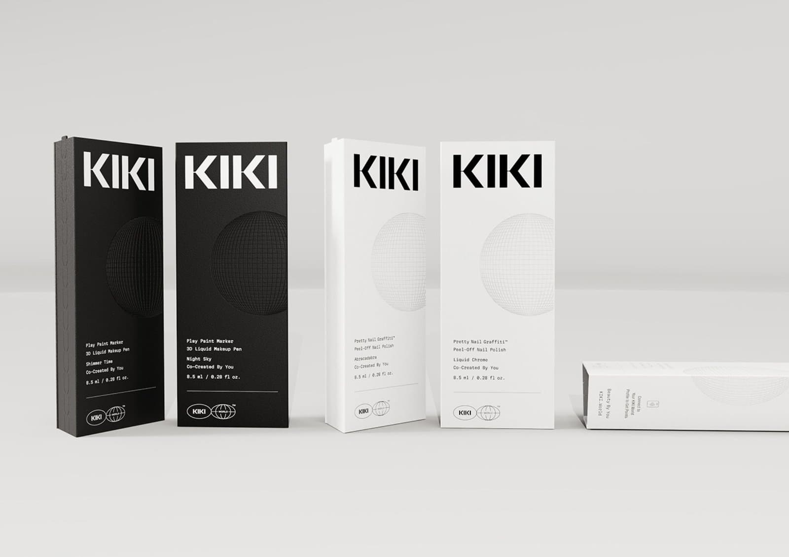 KIKI World secondary packaging architecture — multi-tier carton holding primary bottles, campaign card, and application components
