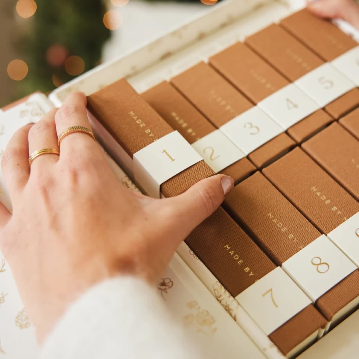 Made by Mary — holiday jewelry advent calendar with 12 individually branded boxes
