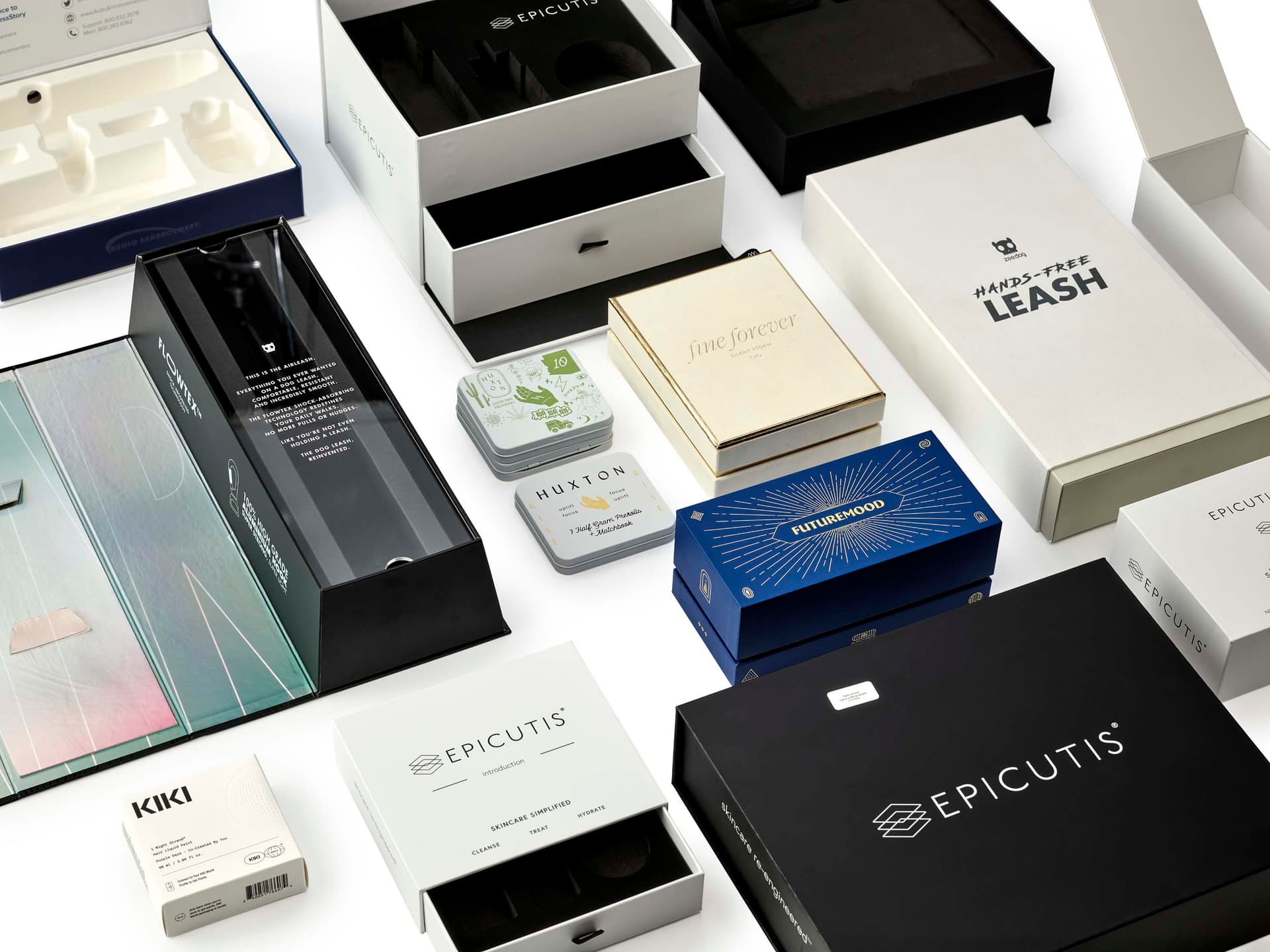 Custom packaging formats including rigid boxes, folding cartons, and specialty finishes